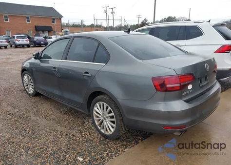 2016 Volkswagen Jetta 1.8T Sel z USA, uszkodzony, nr VIN 3VWL07AJ3GM230746
